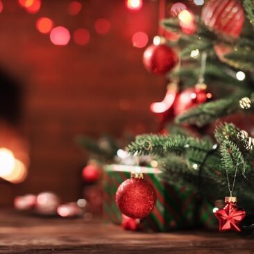 Christmas Tree with Decorations Christmas Tree with Decorations Near a Fireplace with Lights